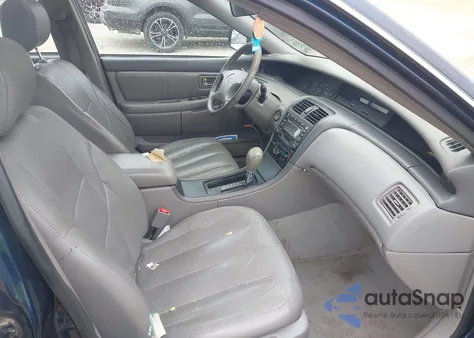 2003 Toyota Avalon Xl z USA, uszkodzony, nr VIN 4T1BF28B83U298301